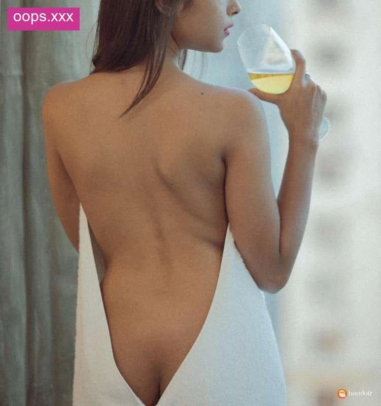 Featured image for Sexy model gets topless wearing pink panty for indoor photoshoot while relaxing. See her perfect tits reveals in a photoshoot.