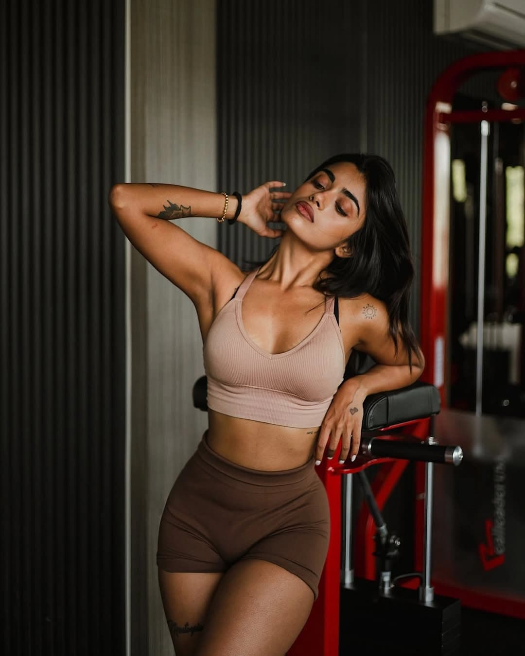Featured image for Fitness model Simi Das flaunts her thin body and bubble butt in see-through bikini pics