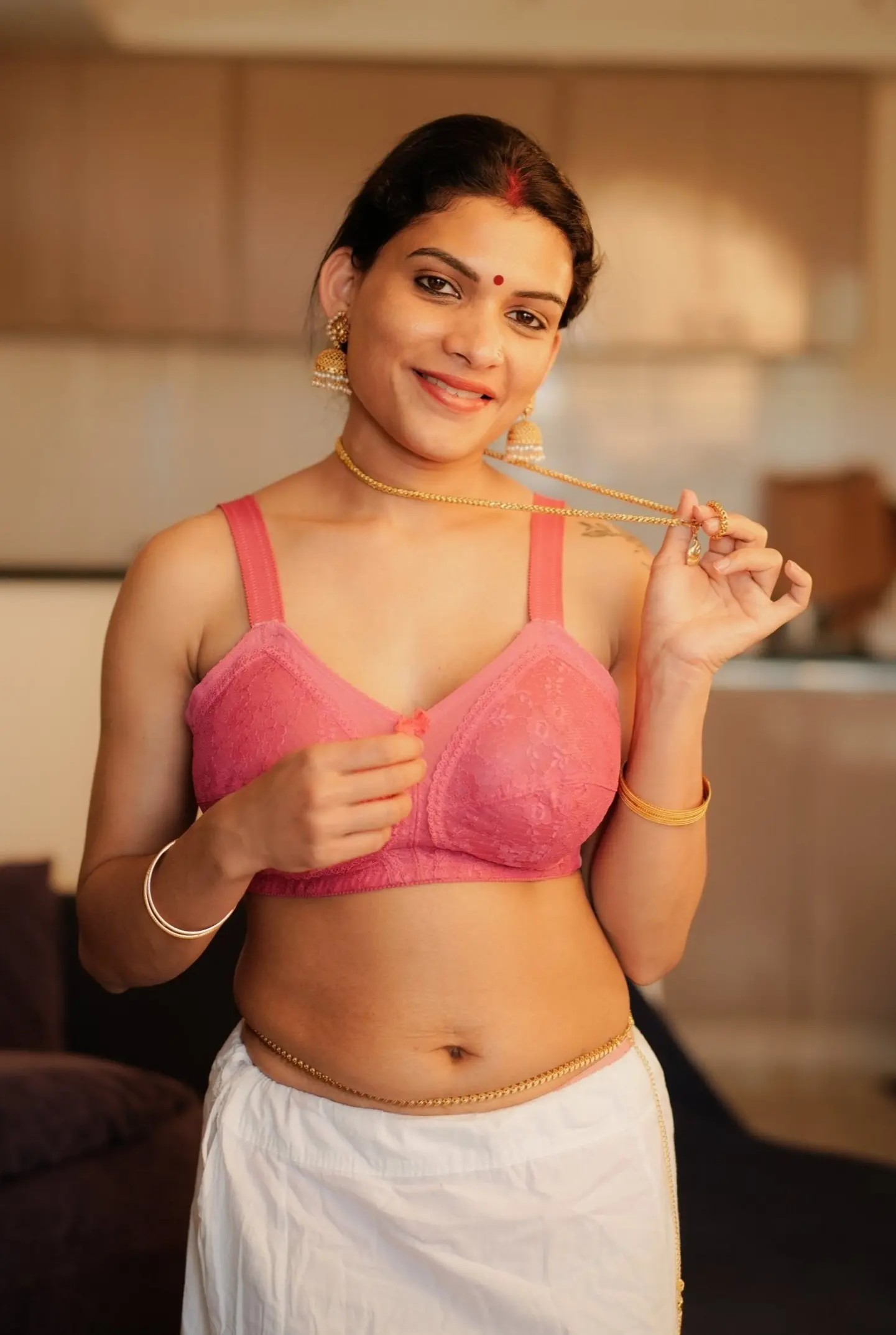 Featured image for Malayali owner Resmi Nair and her hot maid Tina Nandi strip naked and rub each other's pussy till they're soaking wet.